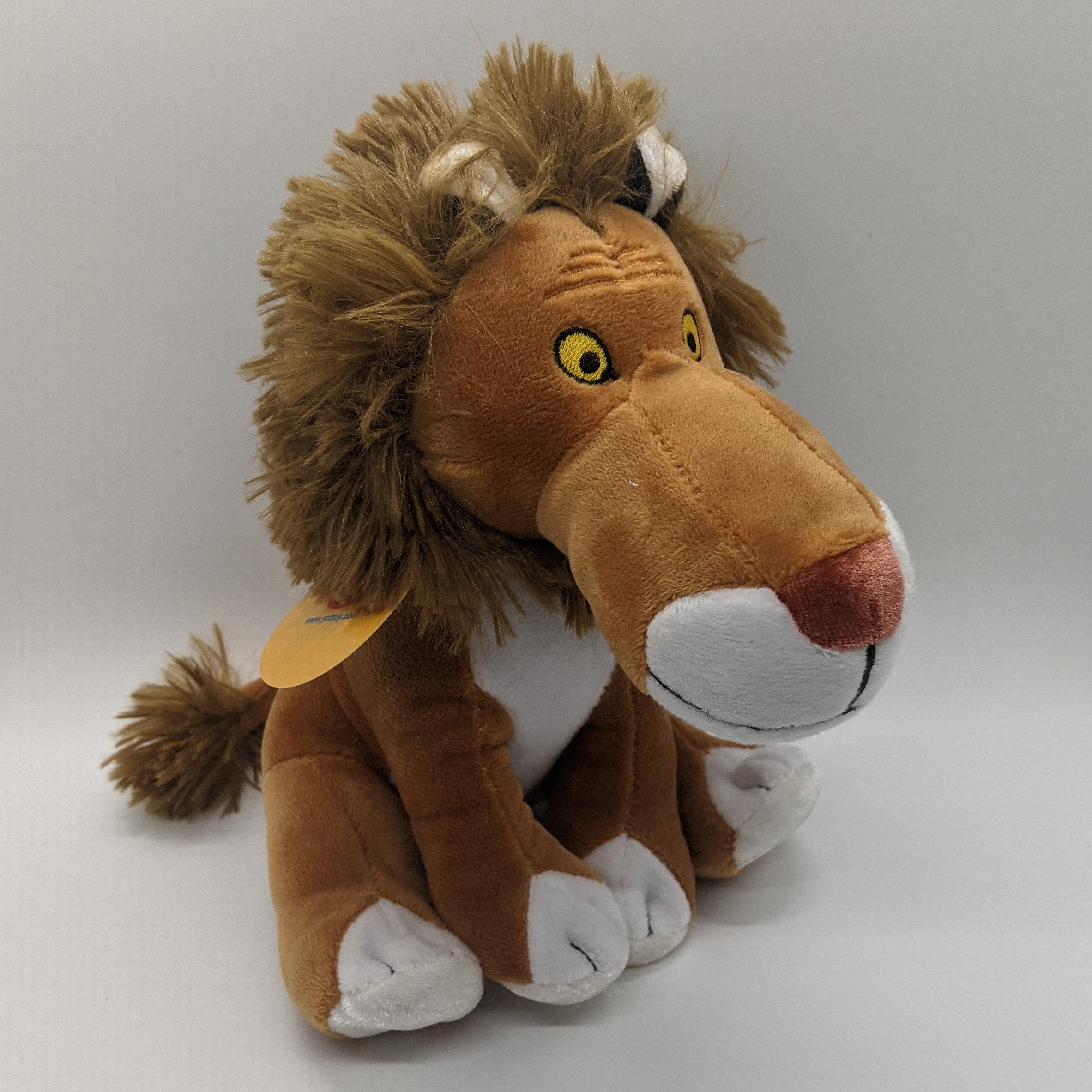 Tawny Scrawny Lion plush | Racine Heritage Museum